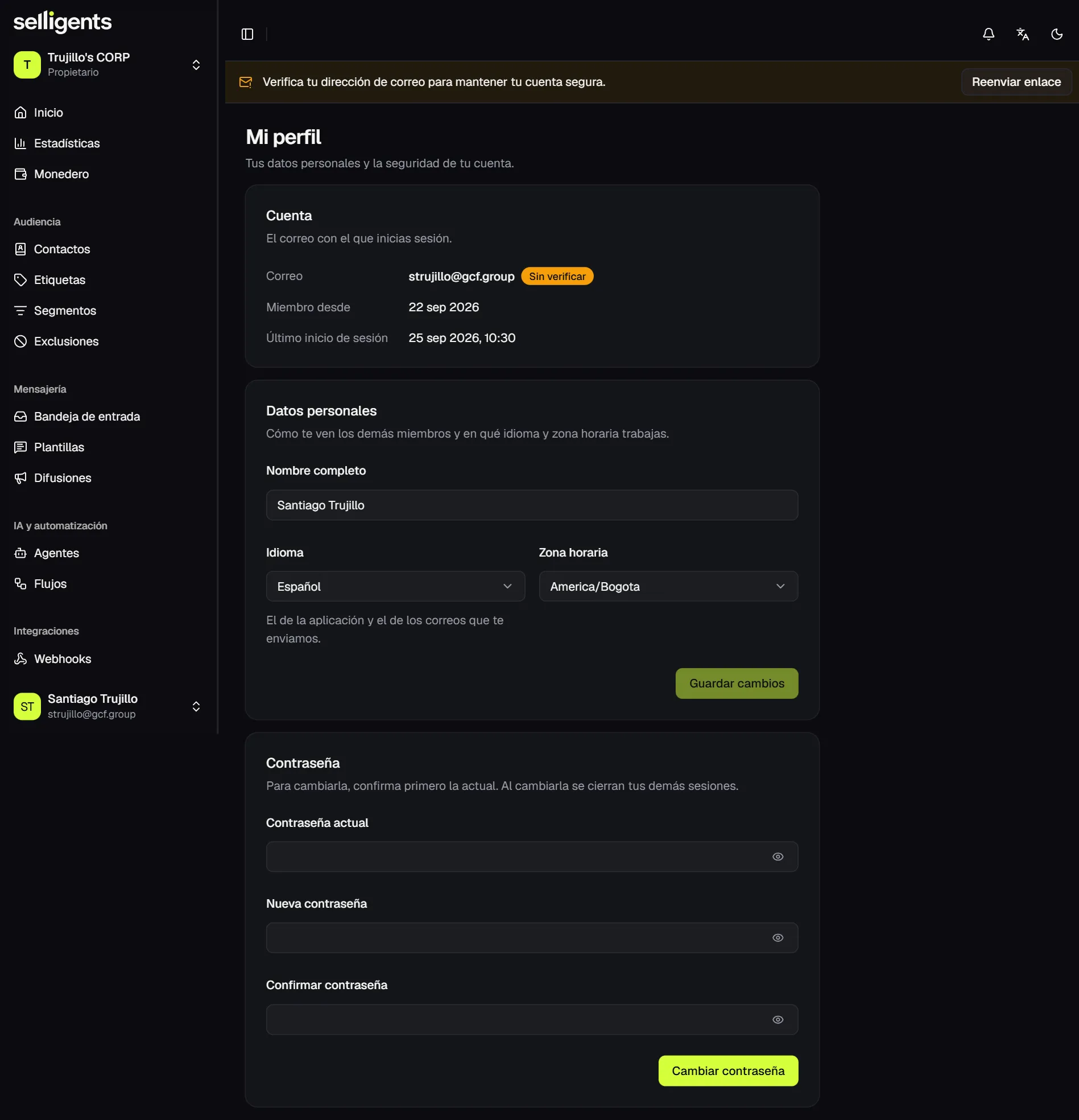 Profile page with the account email and its verification status, the personal details form for name, language and time zone, and the change password form.